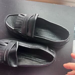 Black Leather Loafers with Fringe Detail